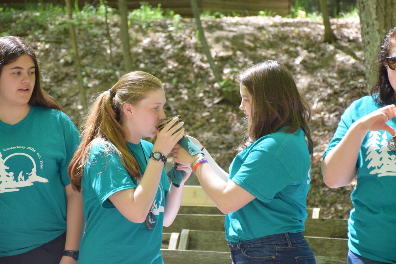 Administering Holy Communion. Photo: Canterbury Hills Camp staff