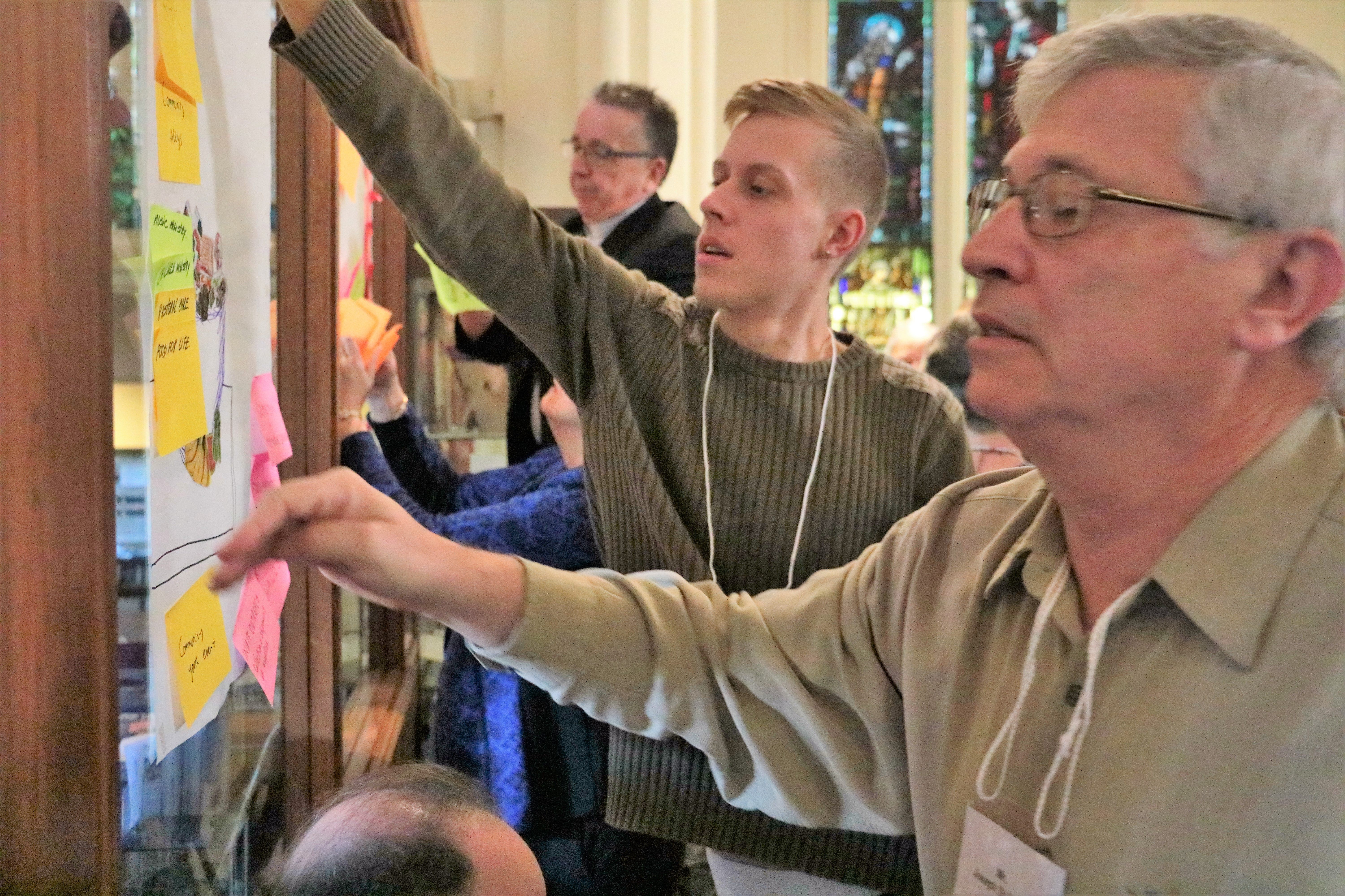 The walls were covered in a rainbow of sticky notes after delegates recorded all the activities and ministries in which their parishes were engaged. Photo: Hollis Hiscock 