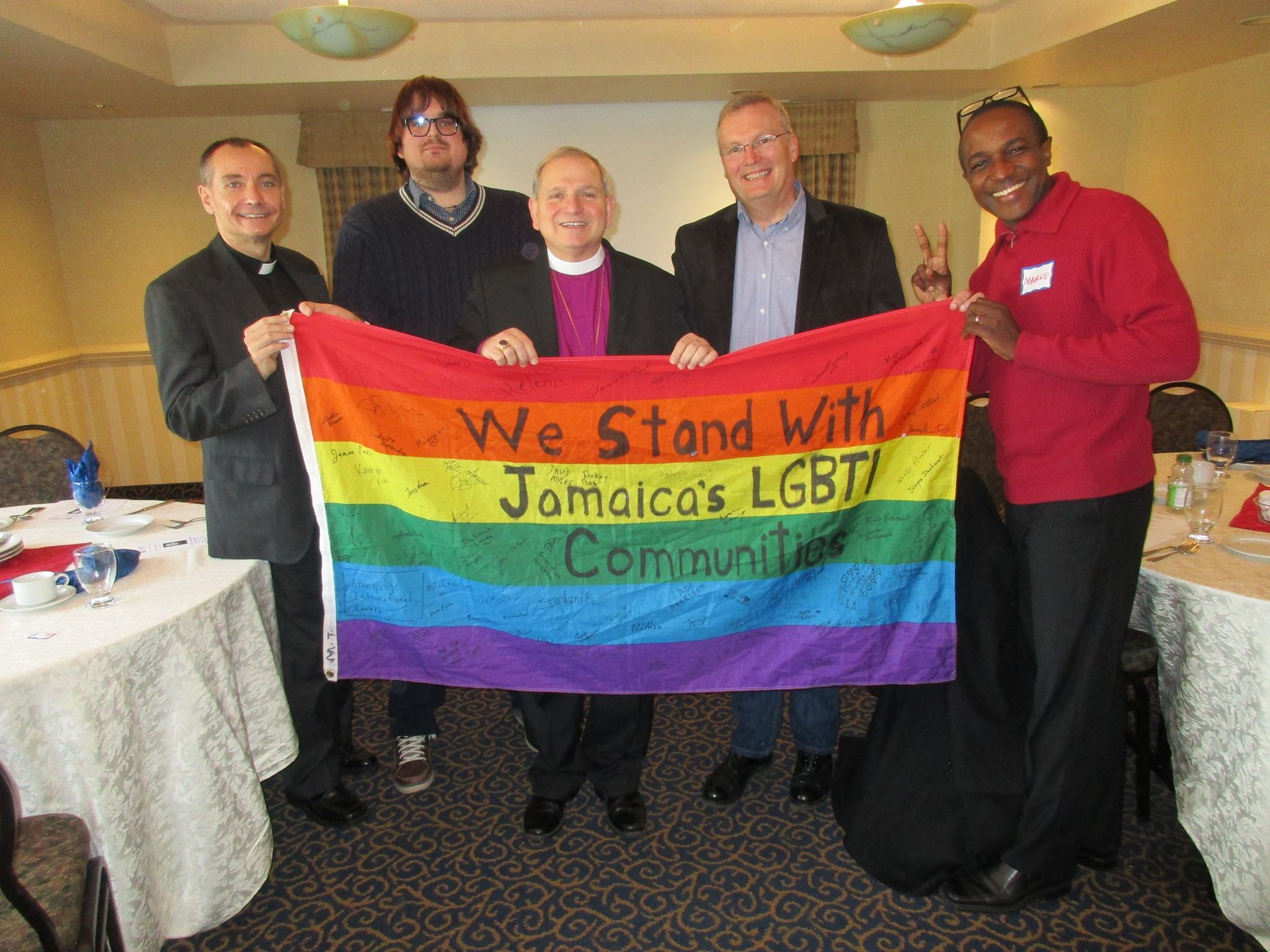 maurice-and-bishop-with-flag