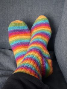 While most socks knit by Donna Ellis during the pandemic have been given away, this pair was kept.