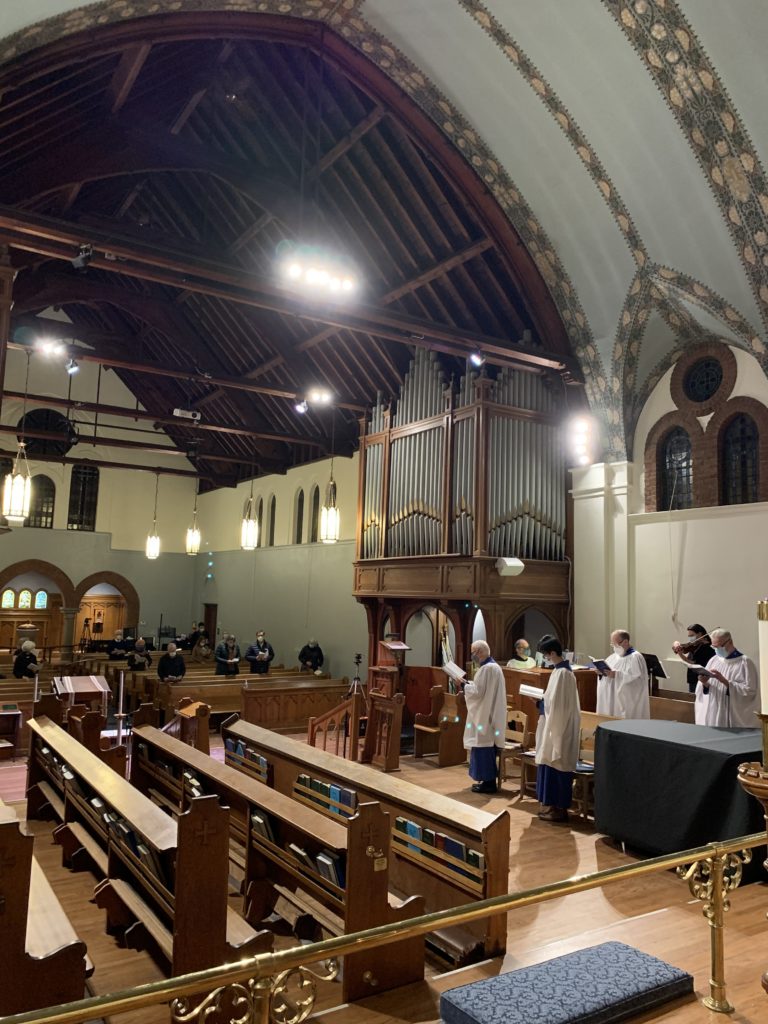 The choir leads worshippers at the Ash Wednesday service of St. John the Evangelist, Hamilton