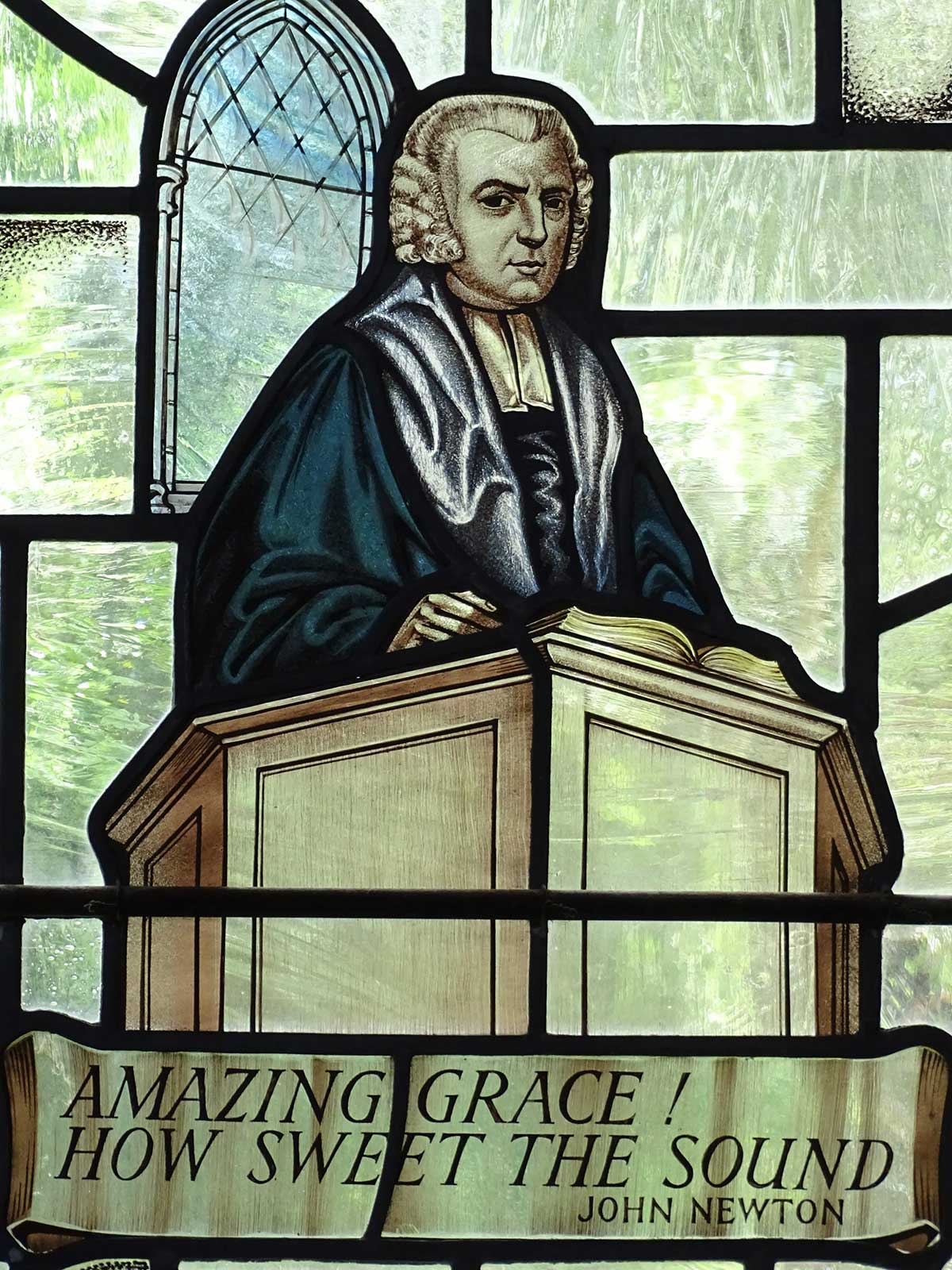 Stained glass of John Newton from Sts. Peter and Paul Church, Buckinghamshire, England. Photo: Wikimedia Commons