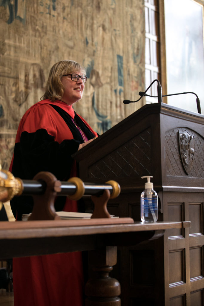 Bishop Susan speaks from the lectern